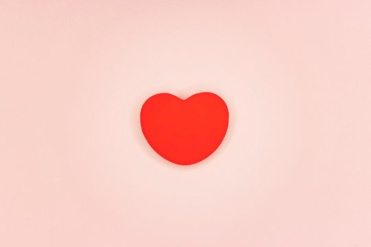 Beautiful background, red heart on a pink background, mimimi