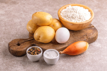 Ingredients for traditional potato pancakes or latke Hanukkah celebration