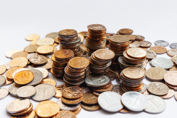 Big heap of columns of different Russian coins on white background.
