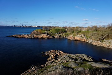 Fototapeta na wymiar Panoramic view over deep blue baltic sea and island of Suomenlinna to Helsinki