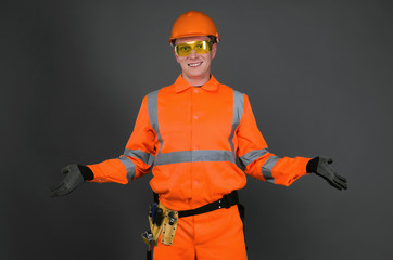 Guilty builder worker  justifies about lateness of construction and spreads his hands  isolated on...