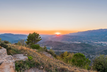 View of the mountain landscape at sunset in Siurana, Tarragona, Catalunya, Spain. Copy space for text.