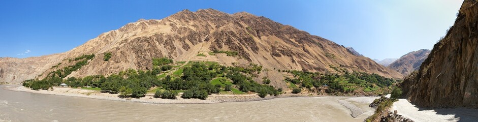 Panj or Amu Daria river and Pamir mountains Tajikistan