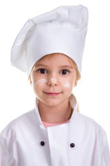 Floured face. Portrait of a cute girl chef white uniform isolated on white background