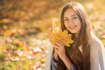 Beautiful  woman in the autumn park