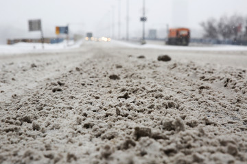 Snow-covered road, the marks of wheels