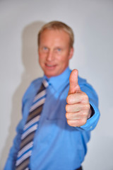 friendly businessman thumbs up