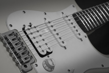 Black white solo electric lead guitar, rock music concept