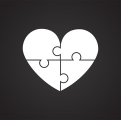 Heart puzzle on black background icon