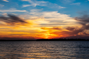 Fototapeta premium Sunset on a lake in Oklahoma.