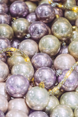 Décoration de Noël, boules teintes pastels rose mauve doré