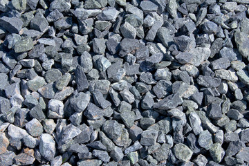 Granite rubble closeup. Material for construction. Building.