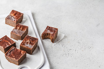 Raw Vegan Chocolate Cake Slices on white background.