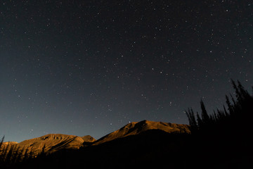 Lunar alpenglow above the San Juan Mountains in Colorado