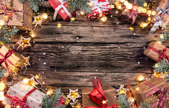 Christmas gifts on wooden background