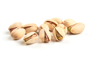 Pistachio nuts, isolated on a white background. Close-up.