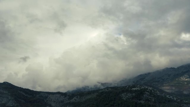 Timelapse - White Cumulus Clouds Swim Over Picturesque Beautiful Mountains In The Autumn Time