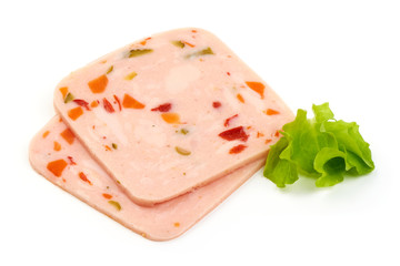 Sliced boiled ham sausage with lettuce, isolated on a white background. Close-up