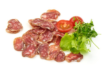Jerked Sausages from pork with lettuce and tomatoes, isolated on a white background. Close-up