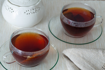 glasses of hot tea on the table
