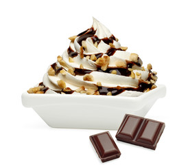 Soft vanilla ice cream with Chocolate sauce and hazelnut / filbert sundae or frozen custard in bowl or dish isolated on white background