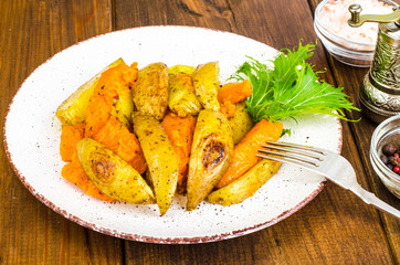 Healthy vegetarian diet food, baked vegetables, pumpkin and potatoes