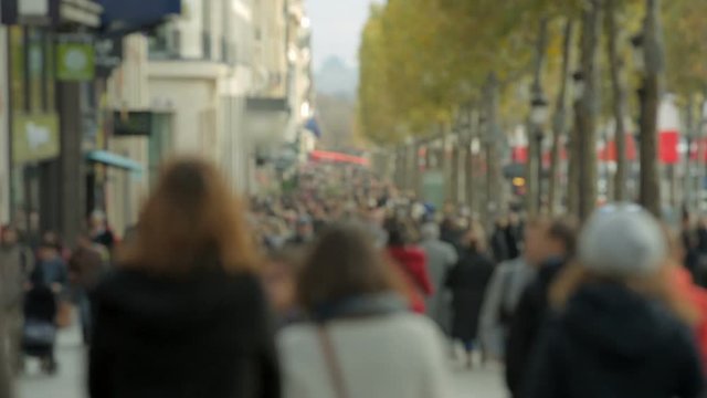 Crowded street Champs-Elys&eacute;e in Paris. Tourists.  