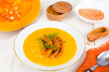 Healthy diet food. Cream soup with lentils and pumpkin