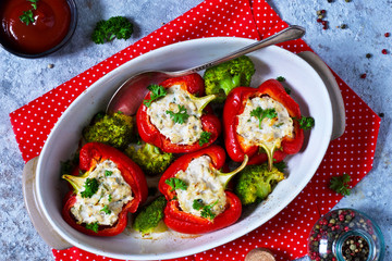 Red paprika stuffed with meat and cheese and spices. Baked stuffed peppers. Top view. Advertising menu.