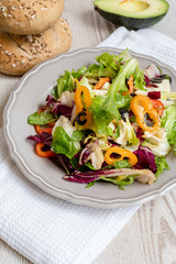 Vegetable salad with avocado, feta cheese, and vegetables