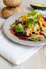 Vegetable salad with avocado, feta cheese, and vegetables