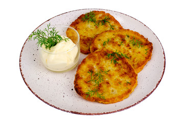 Vegetarian vegetable fried potato pancakes with sauce