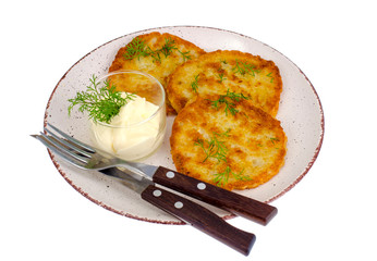 Vegetarian vegetable fried potato pancakes with sauce