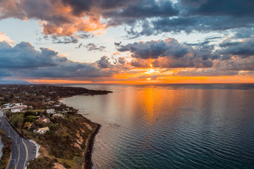 Glowing sunset over Mornington Peninsula and Nepean Highway. Frankston, Victoria, Australia