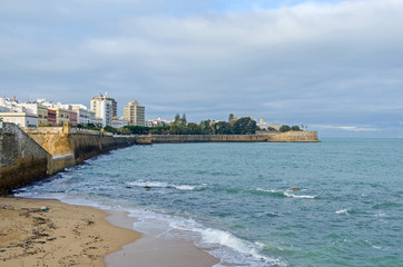 City walls with the bastion Baluarte de la Candelaria and the park of Alameda Apodaca  in the Old...