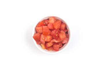Chopped Tomatoes in a white bowl Top view