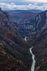 The water of the Verdon River in the Verdon Gorge is a brilliant green color. The canyon in France is one of the most beautiful in Europe