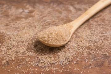 Pile of demerara sugar in a spoon
