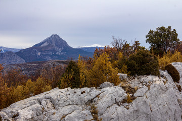 The French Alpes can be seen in the distance from the rim of Verdon Gorge