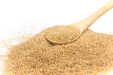 Pile of demerara sugar in a spoon