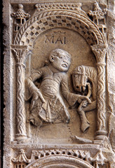 allegoria del mese di maggio; bassorilievo dello stipite del portale settentrionale del Duomo di Modena;