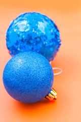 christmas decoration toys on orange background