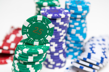 Stack of casino chips isolated on white