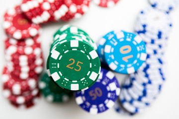 Stack of casino chips isolated on white