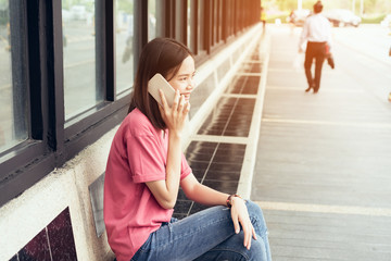 Fototapeta premium women are talking on smartphone and technology makes lifestyle easier.