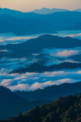 Fototapeta premium landscape of Mountain with Mist in Nan province Thailand