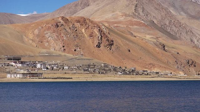 Beautiful scenery with small Tibetan Korzok village on slope of Himalaya mountains near Tso Moriri lake. Ladakh, India