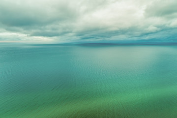Nothing but clouds over shallow water with copy space - aerial landscape