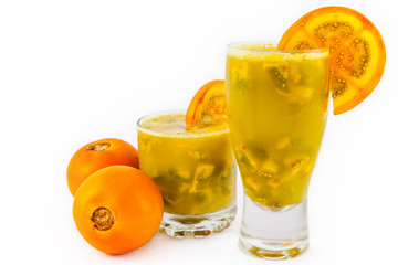 Traditional Colombian beverage made of juice and pieces of lulo (Solanum quitoense) called lulada