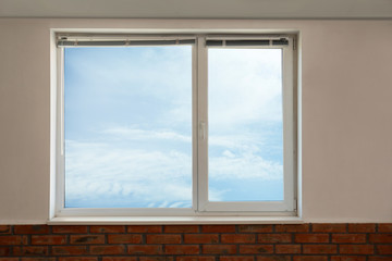 New modern glazed window indoors. Home interior